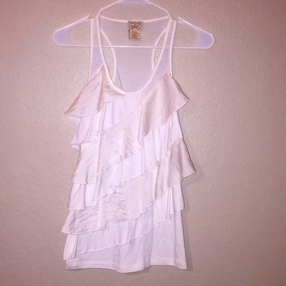 White ruffled blouse.